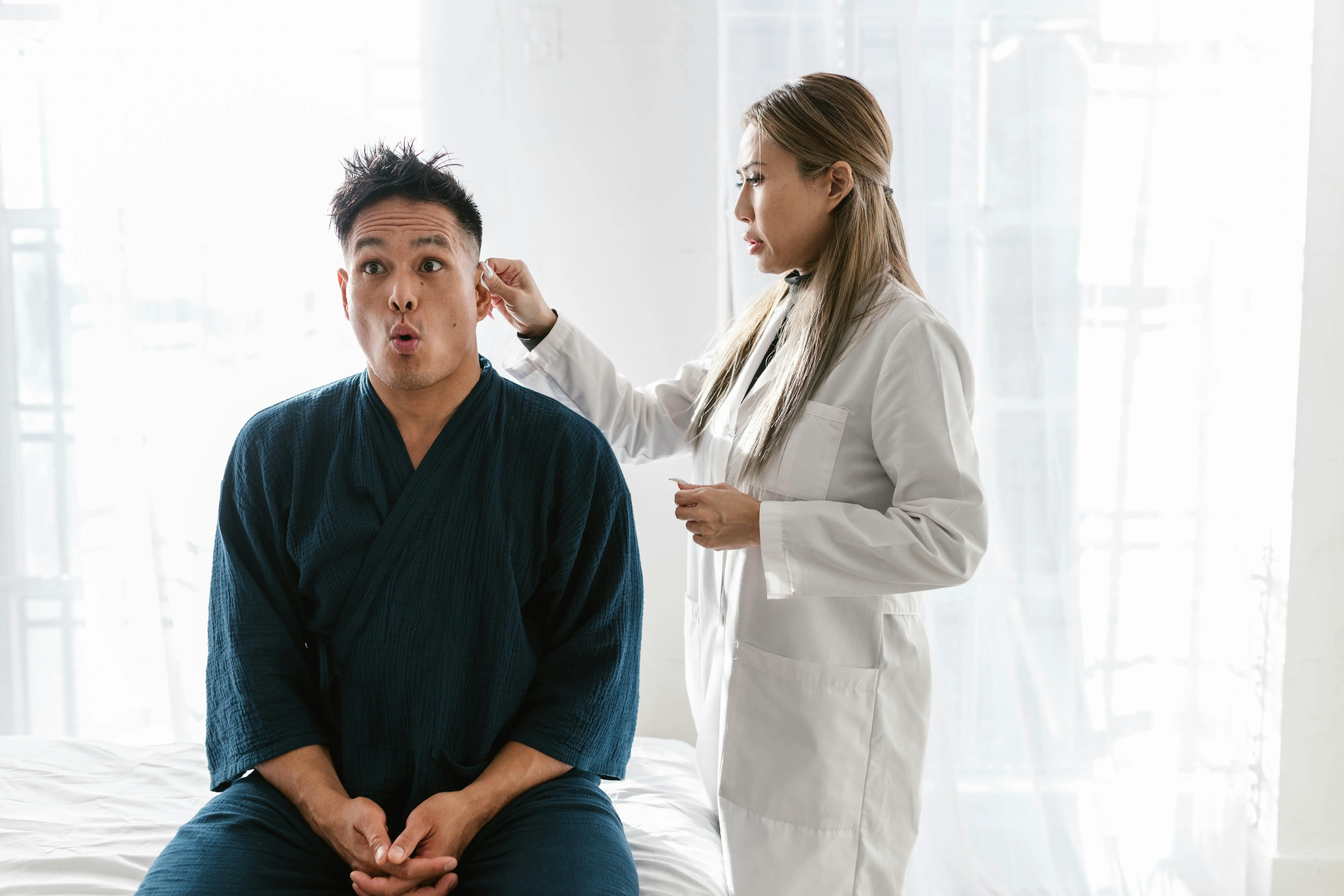 Expat consulting with doctor at a private hospital in Bangkok, Thailand